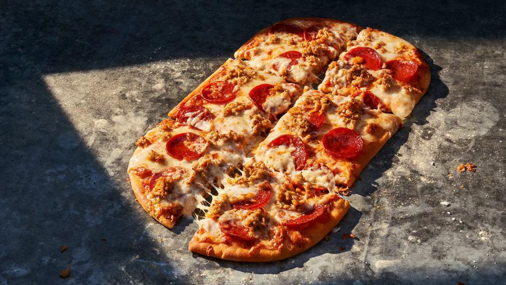 Sausage & Pepperoni Flatbread Pizza · 900 Cal. Chicken sausage crumbles, thick sliced pepperoni, our shredded Fontina and mozzarella cheese blend with tomato bell pepper sauce on our flatbread. Allergens: Contains Wheat, Milk