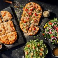 2 Flatbread Pizza Family Feast · A meal to feed the whole family, including any 2 Flatbread Pizzas and 2 whole salads. Serves...