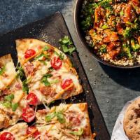 Warm Bowl And Flatbread Pizza · Selection of a warm bowl and a flatbread pizza