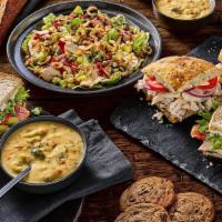 Premium Family Feast With Cookies · A meal to feed the whole family. Includes 4 Half Sandwiches, 1 Whole Salad, 1 Quart of Soup,...