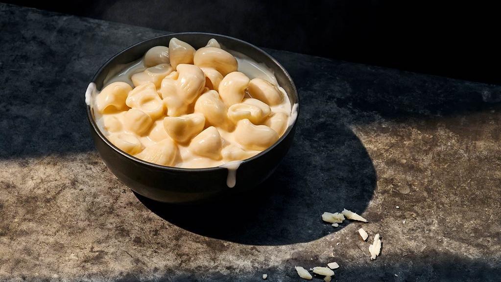 Mac & Cheese · Large (920 Cal.), Small (460 Cal.), Bread Bowl (1130 Cal.), Group (1840 Cal.) Tender shell pasta in a blend of rich cheeses including our tangy aged white cheddar cheese sauce. Allergens: Contains Wheat, Milk, Egg