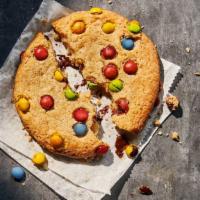 Candy Cookie · 420 Cal. Freshly baked sugar cookie topped with semi-sweet chocolate candies. Allergens: Con...