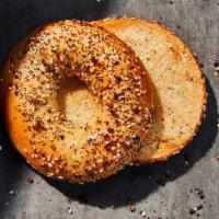 Everything Bagel · 290 Cal. Freshly baked bagel topped with sesame seeds, poppy seeds, dried garlic, toasted on...