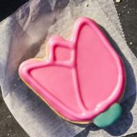 Tulip Cookie · 430 Cal. Freshly baked all-butter shortbread cookie shaped like a tulip and decorated for Sp...