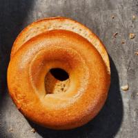 Plain Bagel · 280 Cal. Freshly baked bagel lightly sweetened with brown sugar. Allergens: Contains Wheat