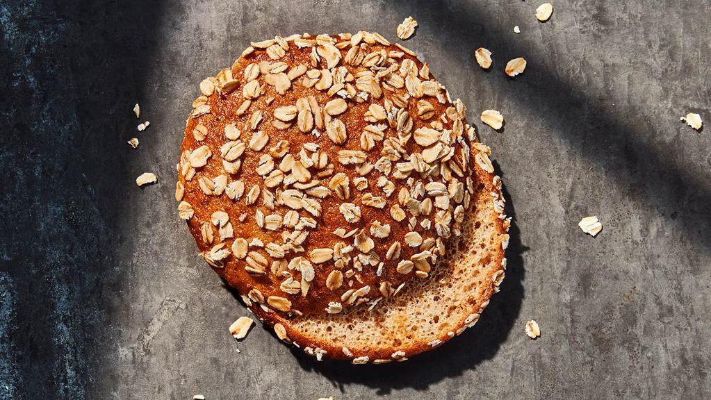 Sprouted Grain Bagel Flat · 180 Cal. Freshly baked sprouted whole grain bagel topped with oats, pinched and slightly flattened to the perfect size. 2 servings of whole grain/bagel flat. (62% whole grain) Allergens: Contains Wheat