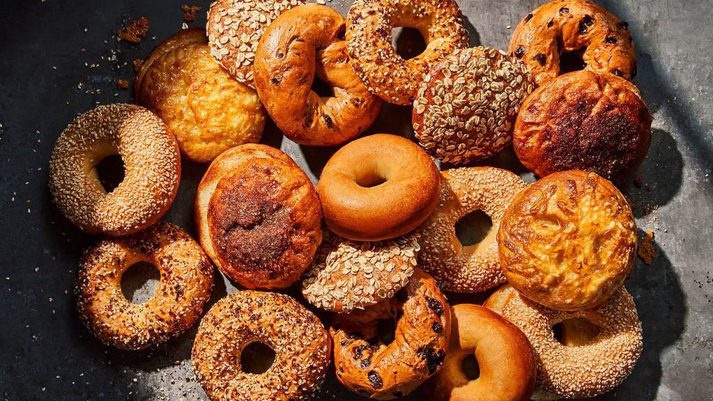 Dozen & A Half Bagels · 18 freshly baked bagels. Cream Cheese tubs sold separately from the Sides menu.