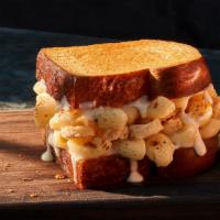 Kids Grilled Mac & Cheese Sandwich · 430 Cal. Creamy Mac & Cheese with our fontina and mozzarella cheese blend and parmesan crisp...