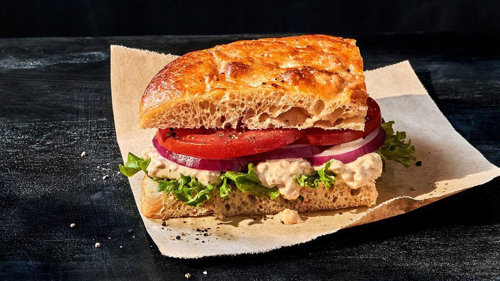 Kids Tuna Salad Sandwich · 370 Cal. Special recipe tuna salad, emerald greens, vine-ripened tomatoes, red onions, salt and pepper on Black Pepper Foccacia. Allergens: Contains Wheat, Egg, Fish