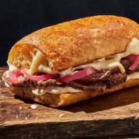 Kids Toasted Steak & White Cheddar · 470 Cal. Grass fed beef, aged white cheddar, pickled red onions and horseradish sauce on Art...