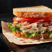 Kids Napa Almond Chicken Sandwich · 320 Cal. Chicken raised without antibiotics tossed with diced celery, seedless grapes, toast...