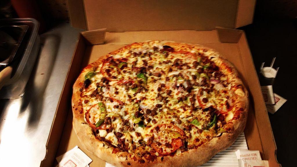 Primo Special Pizza · Double pepperoni, sausage, salami, mushrooms, onions, bell peppers, tomatoes.