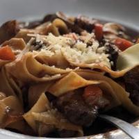 Short Rib Pappardelle · Tender certified angus beef ® short rib, sweet caramelized onions, brown butter, parmesan & ...