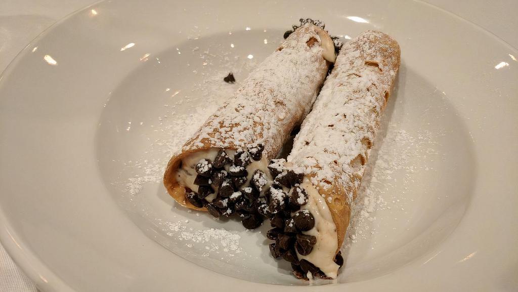 Cannoli (2 Pieces) · Crisp Cinnamon Infused pastry Shell Filled with Sweet Ricotta and Cream Cheese & Semi-Sweet Chocolate chips.