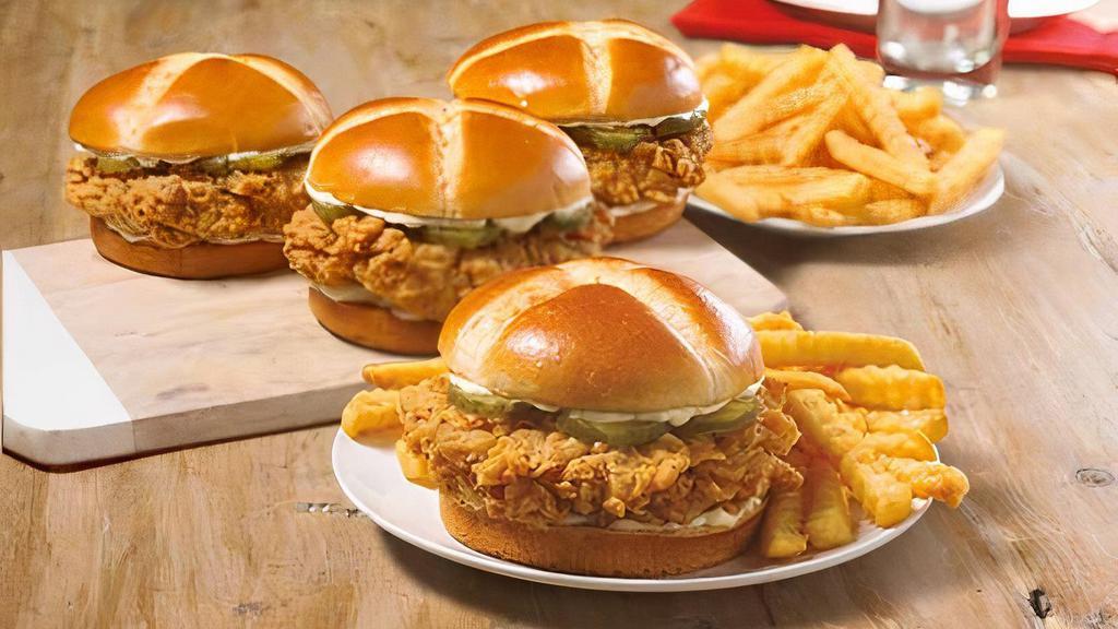 Feed 4 Chicken Sandwich Combo · We crafted a sandwich using our legendary hand-battered chicken fillet placed between a honey-butter brushed and toasted brioche bun. Enjoy this down home flavor with a group with four sandwiches, two large sides and four frosted honey-butter biscuits.