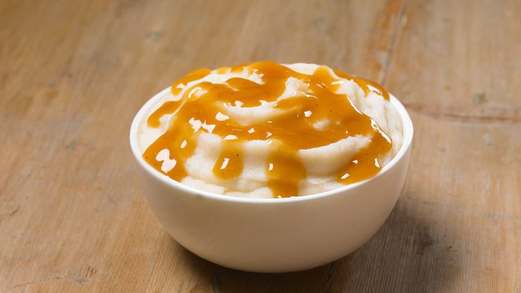 Mashed Potatoes (Regular) · Before you get to the potatoes, let’s talk about our savory, rich gravy. OK, now that we’ve done that, imagine it over a hefty helping of delicious mashed potatoes. Now add to order. You're welcome.