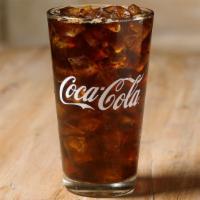 Coke® · Make sure every bite gets a big sip of deliciousness when you order a large fountain drink.
