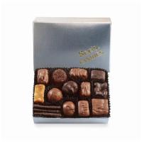 1/2# Silver Assortment  · This gleaming silver gift box holds a half-pound assortment of See's favorite chocolates inc...