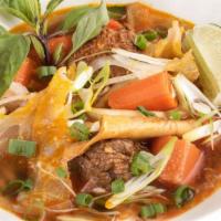 Hủ Tìếu Mì Bò Kho · Rice noodle or egg noodle beef stew