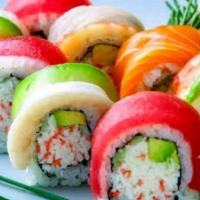 Rainbow Roll · In: crab meat, avocado. Out: assorted raw fish.