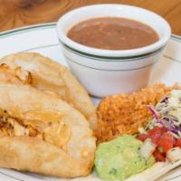 Baja Fish - 2 tacos, rice & beans · Grilled mahi mahi in a chipotle cabbage mix.