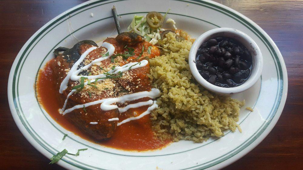 Chile Rellenos · Poblano Chile stuffed with our veggie mix and Mexican cheese, topped with Ranchera  sauce and Sour Cream