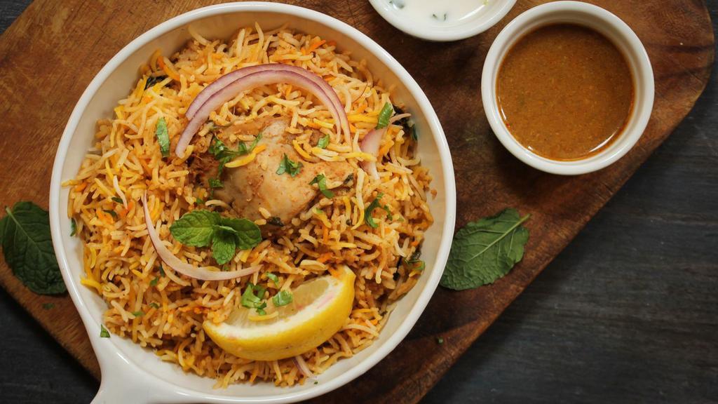Chicken Biryani · Fresh rice loaded with traditional spices and hearty chicken.