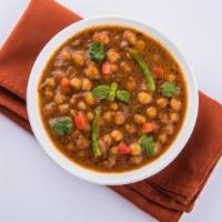 Chana Masala · Hearty chickpeas served in a savory curry sauce.