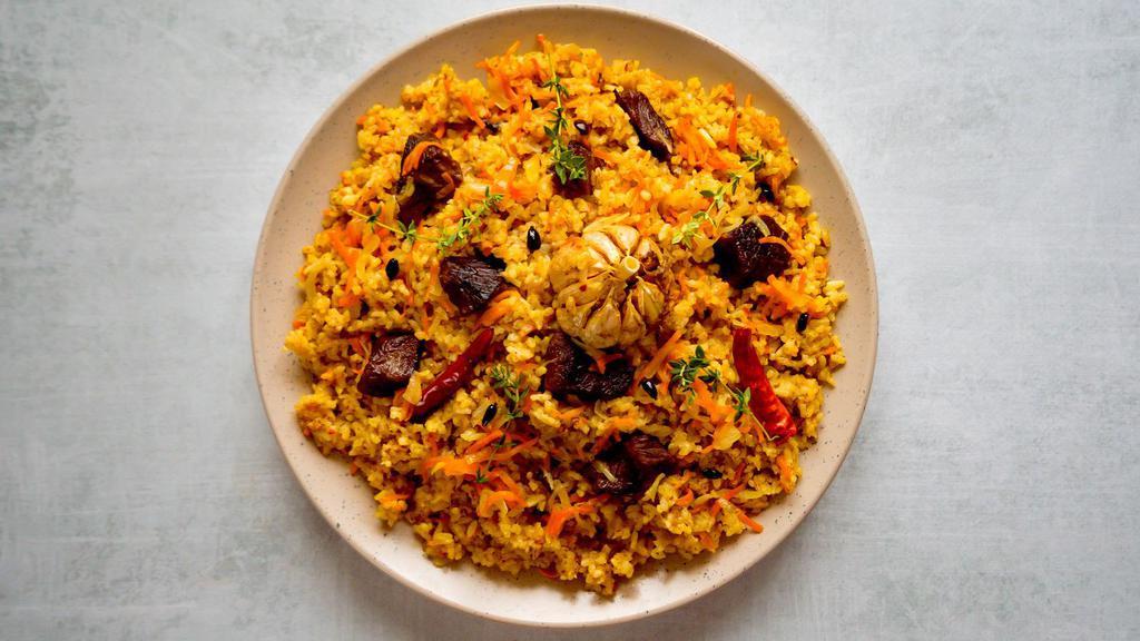Lamb Biryani · Fresh rice loaded with traditional spices and spicy savory lamb.
