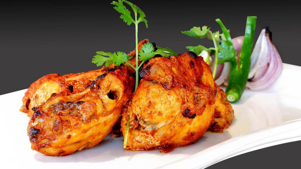Chicken Breast Tandoori · Marinated chicken breast cooked in the tandoori oven.