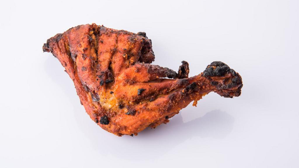 Chicken Leg Tandoori · Marinated chicken leg cooked in the tandoori oven.