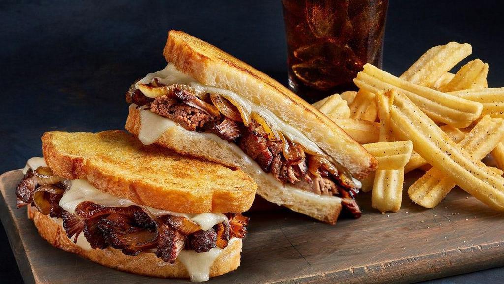 Hot Mess Melt - Combo · Go big or go home with tender slow-roasted beef, caramelized onions and sharp white Cheddar on grilled artisan bread. Includes your choice of a drink and a side to round out the meal. .