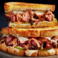 Giddy Up Melt · Chow down with slow-smoked brisket burnt ends, sharp white Cheddar, creamy BBQ sauce and pic...