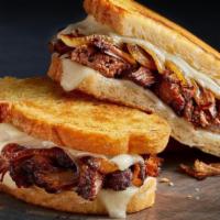 Hot Mess Melt · Go big or go home with tender slow-roasted beef, caramelized onions and sharp white Cheddar ...