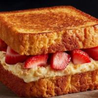 Treatin' Myself Melt · Because you deserve it - get cheesecake and fresh strawberries smashed between grilled butte...