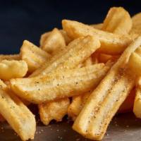 French Fries · Thick-cut, crispy fries seasoned with salt and pepper.