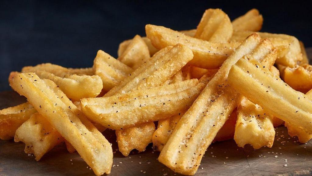 French Fries · Thick-cut, crispy fries seasoned with salt and pepper.
