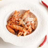 Baked Penne · Penne pasta layered with ricotta and mozzarella and our house marinara. Baked until golden a...