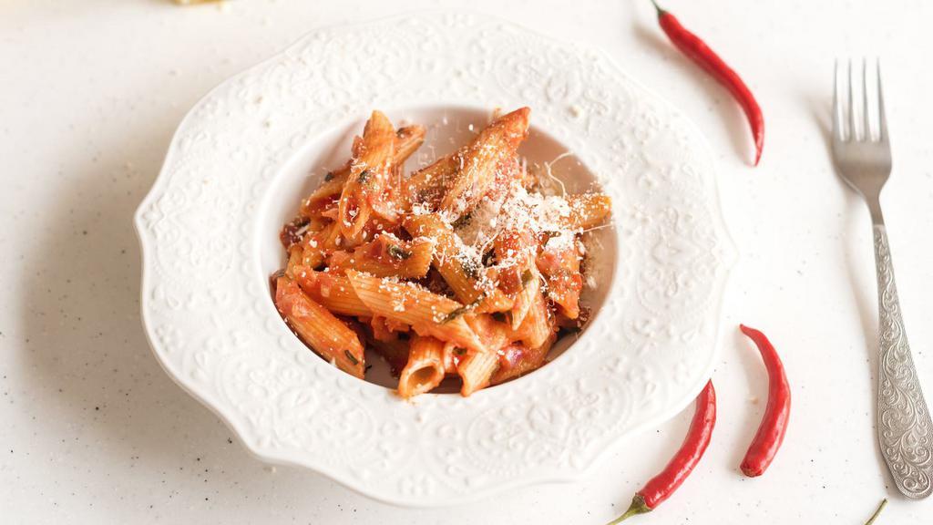 Baked Penne · Penne pasta layered with ricotta and mozzarella and our house marinara. Baked until golden and bubbly.