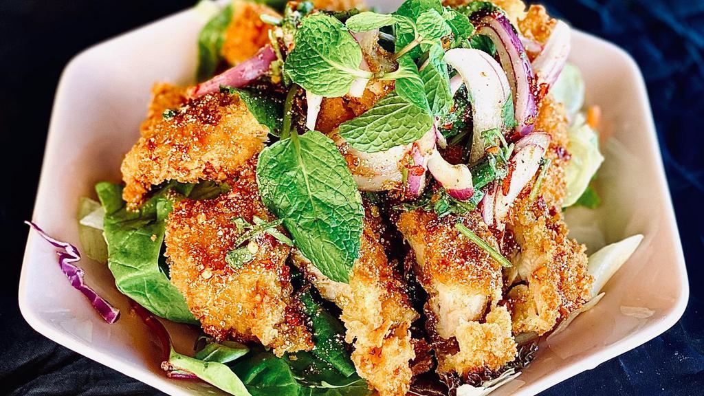 Fried chicken Larb️   · Vegan. Gluten free. Spicy. choice of fried crispy chicken or fried tofu, mixed with red onions, green onions, mint, cilantro and toasted rice with chili lime dressing