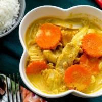 Yellow Curry · Vegan. gluten-free. Yellow coconut curry with potatoes, carrots and onions. Served with jasm...