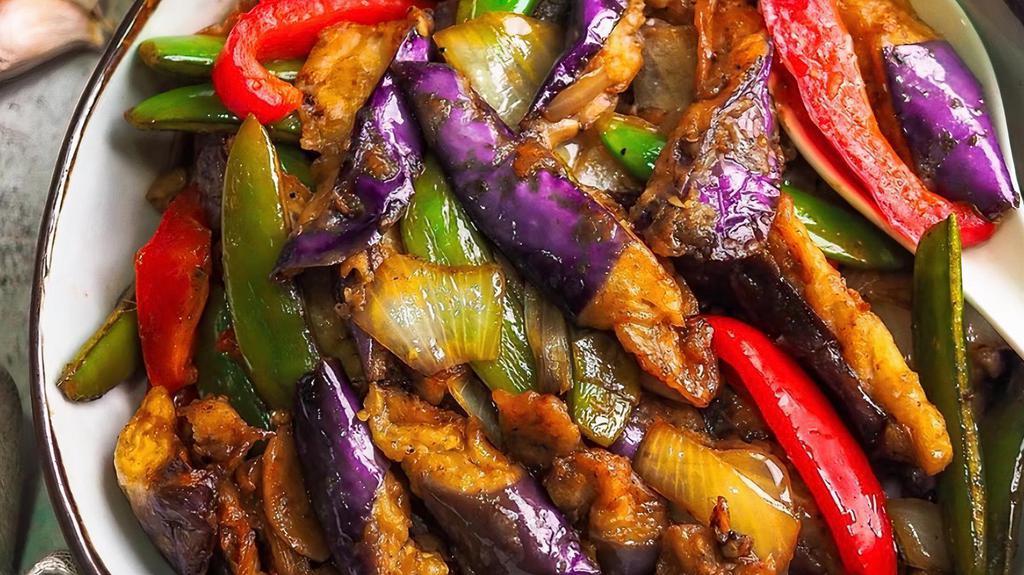 Eggplant Basil · Spicy. Spicy sautéed eggplant, basil, onions, green beans, bell pepper in a spicy chili garlic soy sauce. Served with jasmine rice.