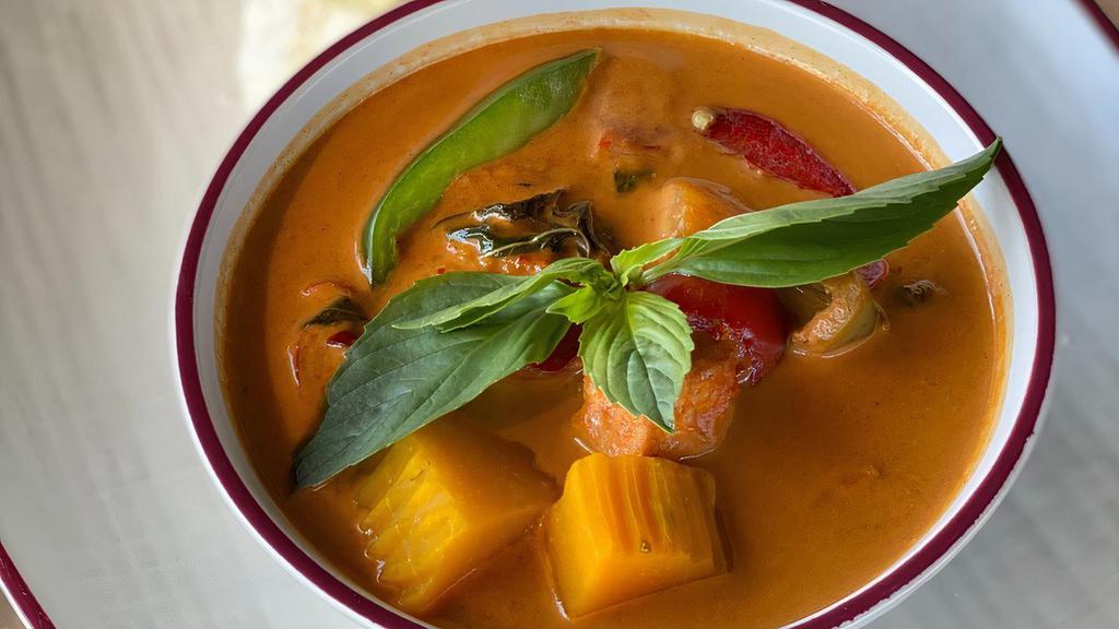 Pumpkin Curry (V) (GF) 🌶️ · Red coconut curry with pumpkin, bell peppers and basil