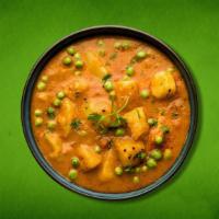 Just Potato & Peas  (Vegan) · Peas and potatoes, simmered to perfection in an onion, tomato and Indian whole spice curry.
