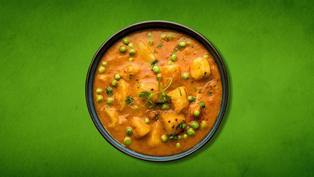 Just Potato & Peas  (Vegan) · Peas and potatoes, simmered to perfection in an onion, tomato and Indian whole spice curry.