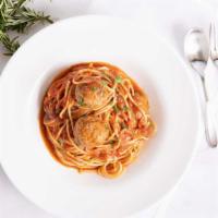Spaghetti con Polpette D'agnello · Spaghetti with lamb meatballs, tomato sauce.