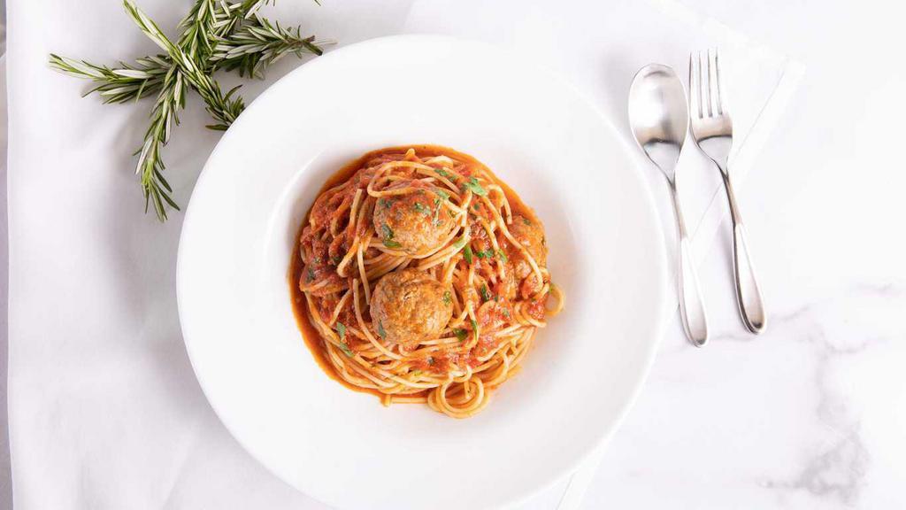 Spaghetti con Polpette D'agnello · Spaghetti with lamb meatballs, tomato sauce.