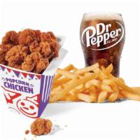Large Spicy Popcorn Chicken Combo · Includes large French Fries and your choice of large drink.
