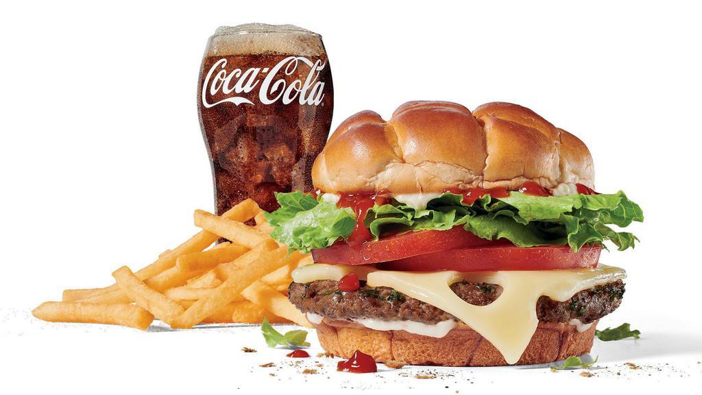 Large Classic Buttery Jack® w/Swiss cheese Combo · Includes large French Fries and your choice of large drink.