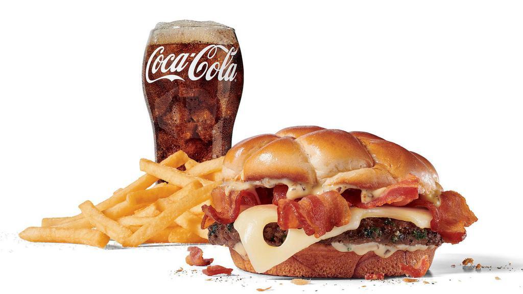 Large Bacon & Swiss Buttery Jack® Combo · Includes large French Fries and your choice of large drink.